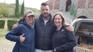 JT and Karen greet Fabio, who delivers bread to the villa each morning.
