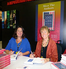 Holly and Kathie sign their second book, 1001 Things to Love About Military Life, at the AUSA 2012 conference.