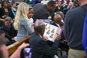 Children gathered in the courtroom with copies of Kimberly’s book No Fear For Freedom to share the historic moment with their local heroes. Photo by Keith Wilk.