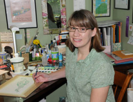 Nina Victor Crittenden paints children's books at her home studio