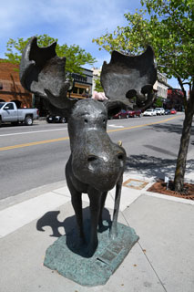 Mudgy and Millie statues in downtown Coeur d’Alene, Idaho, give residents and visitors alike a sense of adventure as they follow the Mudgy Moose Trail.