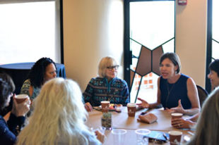 Author and publisher Brooke Warner connects in a small group setting at a retreat especially for women writers.