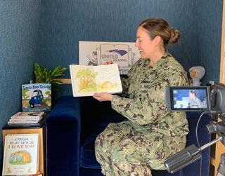 At Story Station events, United Through Reading provides recording equipment and a selection of picture books for military members to read and create video recordings for important children in their lives.